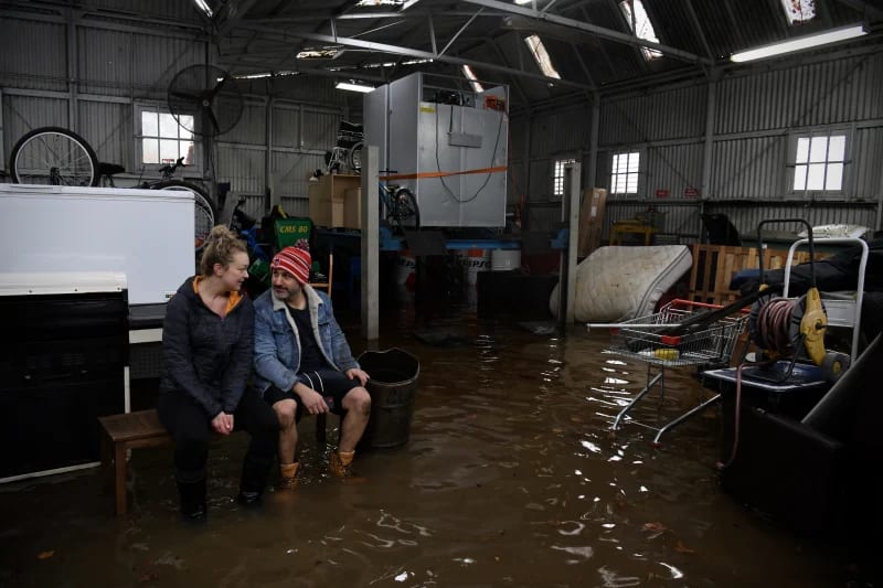 Camden residents Les Hallack and Haley Lines, who in six months have endured four flooding incidents, this particular episode being the worst.