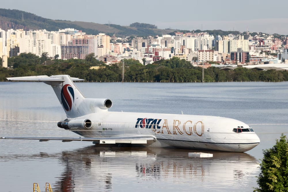 A cargo plane sits on a flooded runway at the airport in Porto Alegre, Rio Grande do Sul, Brazil.