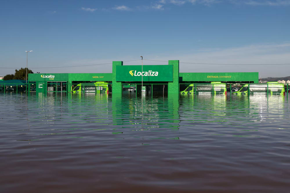 The building of a car rental business is partially submerged amid flooding near the airport in Porto Alegre, Rio Grande do Sul, Brazil, May 6