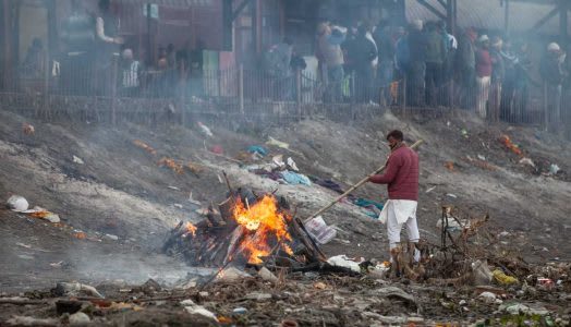 Cremation pyre on the banks of the Yamuna river, Nigambodh Ghat (Ghat 24), Delhi, 2022