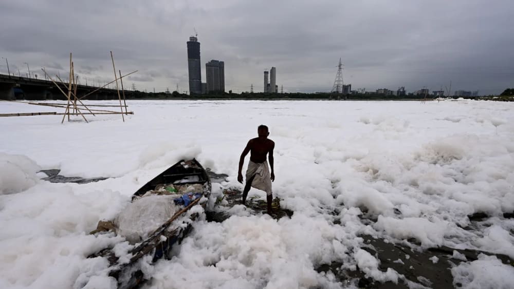 Yamuna river – a tributary of the holy Ganges River covered with a thick layer of toxic foam due to water pollution near Kalindi Kunj, on September 10, 2023 in New Delhi, India.