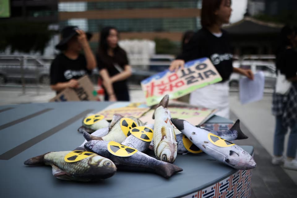 Activists attend a protest at the National Assembly in Seoul, South Korea, August 24, 2023.