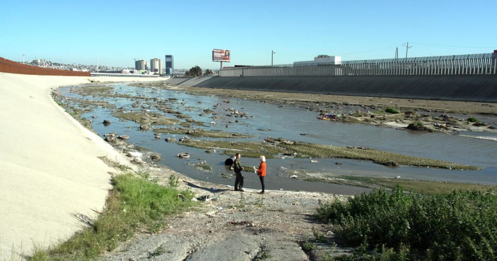 Raw sewage flowing into the Tijuana River