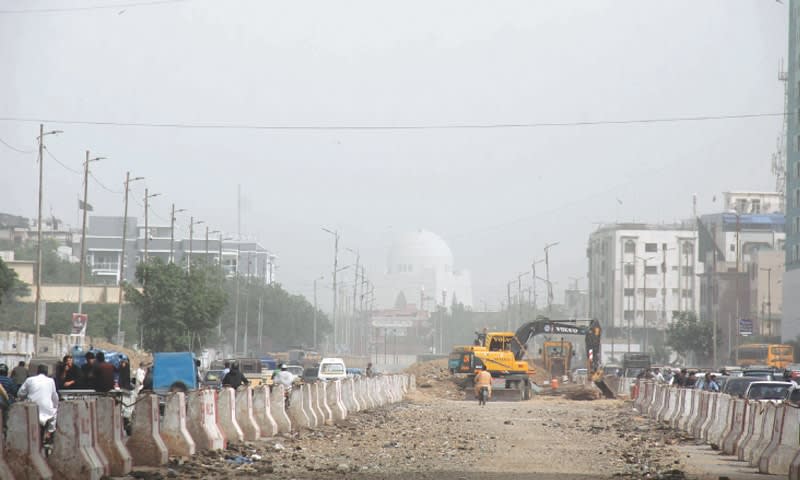 High level of dust particles in the air reduce visibility and envelope the Quaid’s mausoleum.