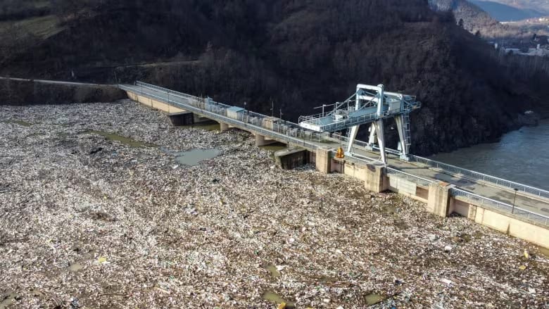 General view of plastic trash littering the polluted Potpecko Lake near a dam's hydroelectric plant, in Serbia
