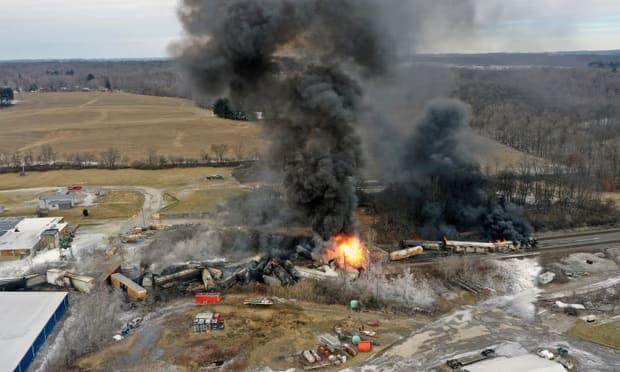 Crews released pesticides from derailed tanks to prevent an explosion.