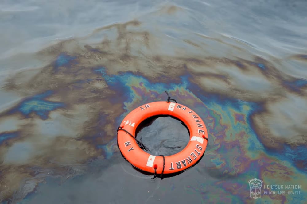 Diesel fuel from the sunken Nathan E. Stewart floats in the Seaforth Channel near Bella Bella