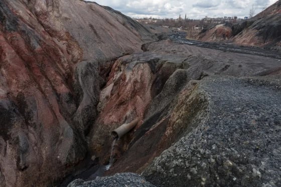 The mines, once the beating heart of the region where giant mountains of metal waste known as slag still dot the landscape, now represent a looming environmental catastrophe.