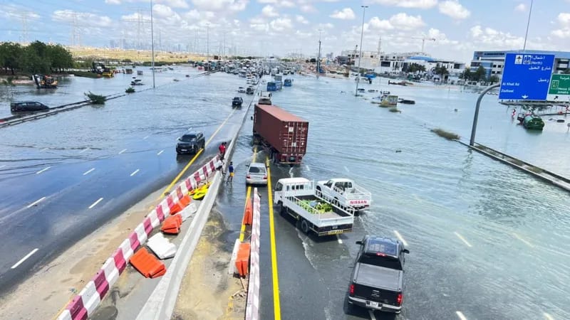 Cars are stuck on a flooded road in Dubai
