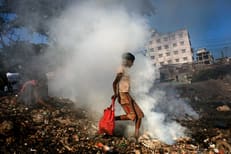Air pollution in Dhaka from burning garbage.