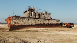 Deserted ship on the show of Aral Sea