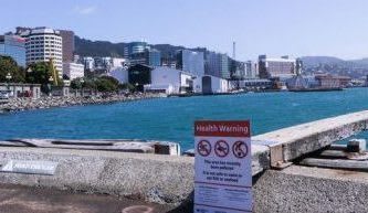 A warning sign on Wellington's waterfront in late 2019 after a sewage pipe blockage caused problems