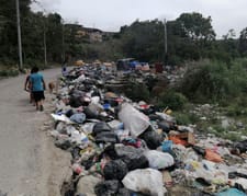 Communal trash disposal locations, commonly known as “pataconcitos”