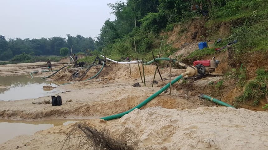 Sand is being extracted from within Raghunandan Hill Reserve Forest area in Habiganj, posing serious threat to its biodiversity. Illegal sand mining puts forest at risk