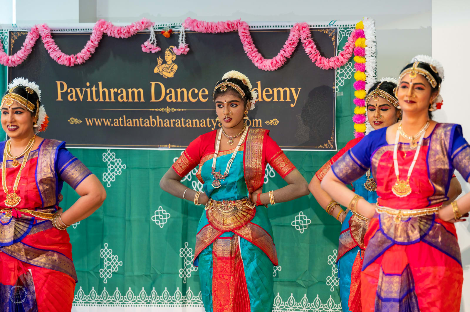 Bharatanatyam dancers performing at Pavithram Dance Academy event