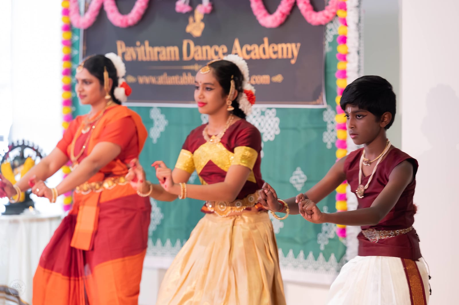 Young dancers performing classical Indian dance at Paithram Dance Academy