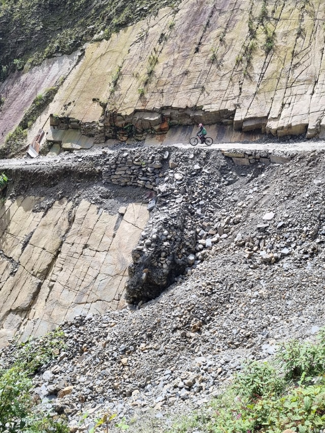 biking on cliff