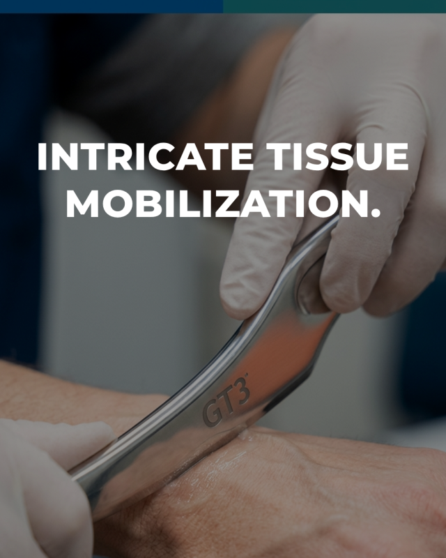 Close-up of Graston Technique instrument-assisted soft tissue mobilization on the hand and wrist