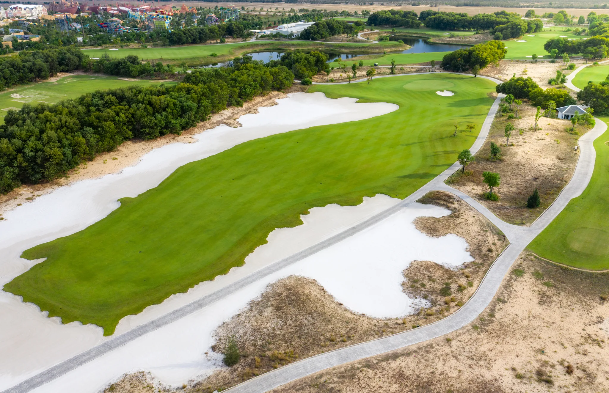 Montgomerie Links Vietnam — links-style fairway with ocean wind and coastal rough