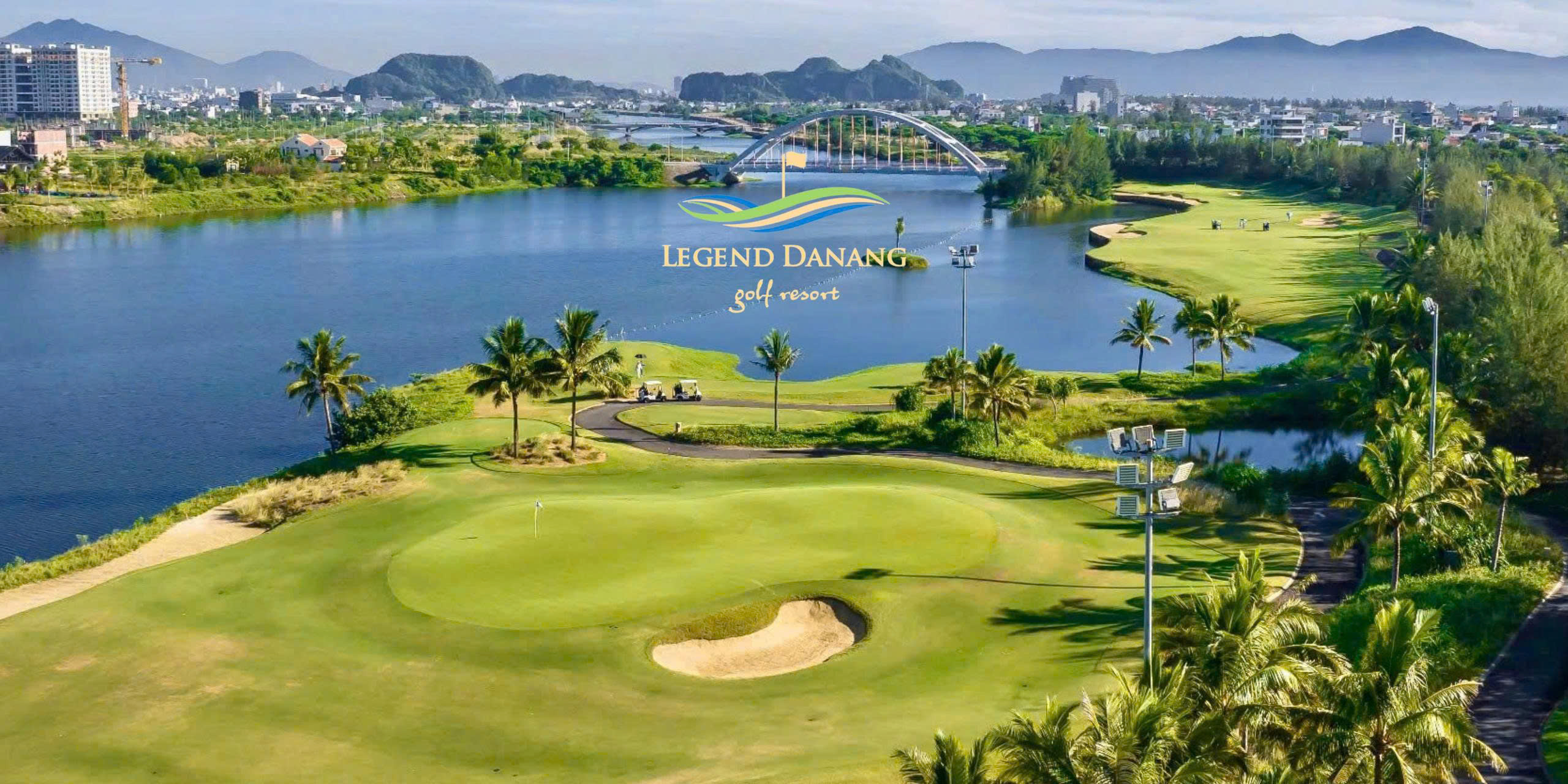 BRG Da Nang Golf Resort clubhouse and fairway with coastal dunes in background