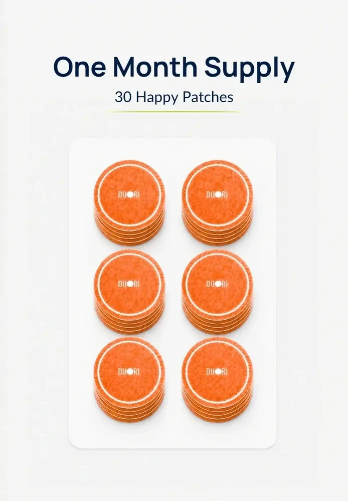 30-count Duori Happy Patches monthly supply displayed on a tray, designed to support mood, emotional wellness, positive energy, and daily well-being.