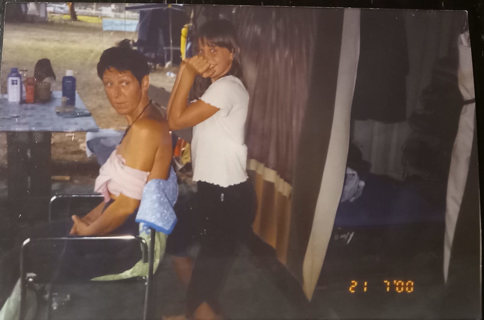 Me at the age of 10 giving a massage to my mom