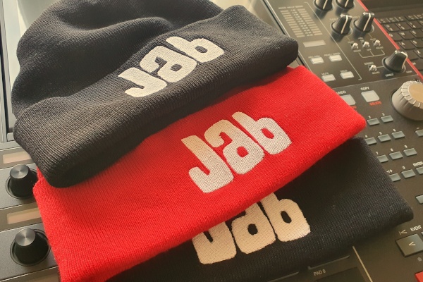 DJ Jab beanies in red and black with white embroidered <b>Jab</b>.