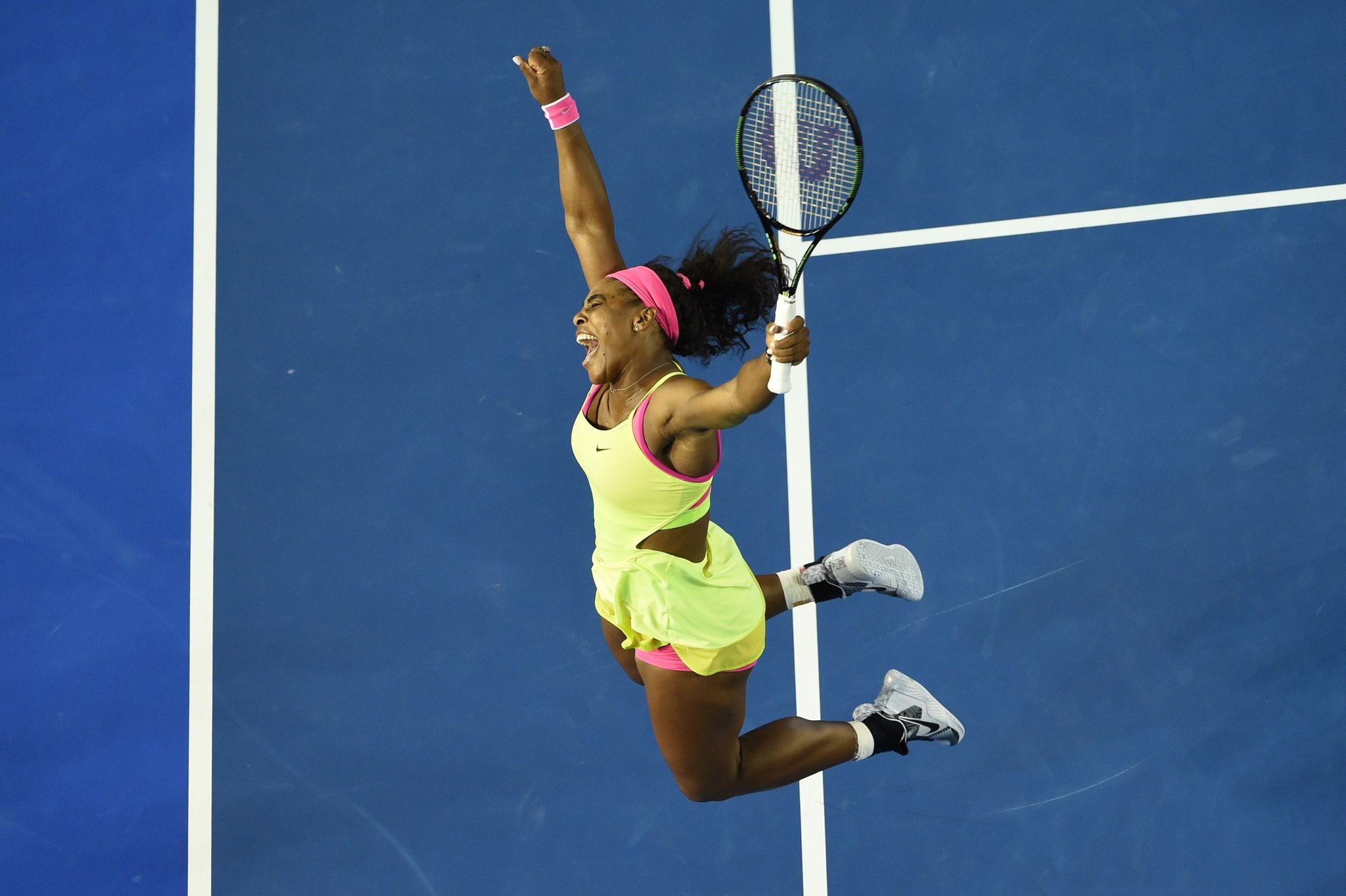 Serena Williams at Australian Open 2015 Final — green and pink Nike outfit