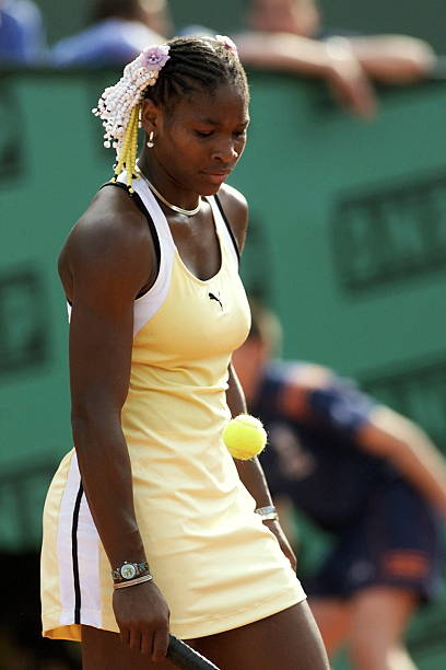 Serena Williams at Roland Garros 1999 Round 3 — white, black, and yellow Puma outfit