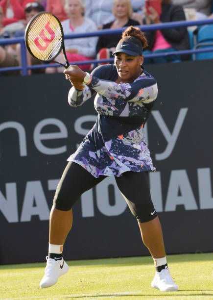 Serena Williams at Eastbourne Tournament 2022 Doubles Round 1 — purple, blue, black, and white Nike outfit