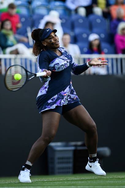Serena Williams at Eastbourne Tournament 2022 Doubles Quarter-Final — black, white, purple, and blue Nike outfit
