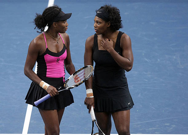 Serena Williams at Porsche Tennis Grand Prix 2008 Doubles Round 1 — black Nike outfit