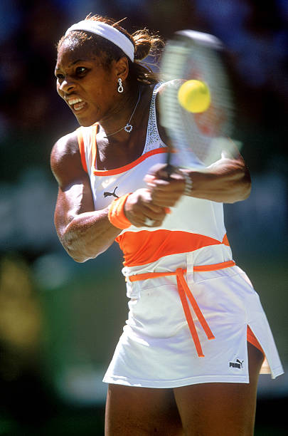 Serena Williams at Australian Open 2003 Semi-Final — orange and white Puma outfit