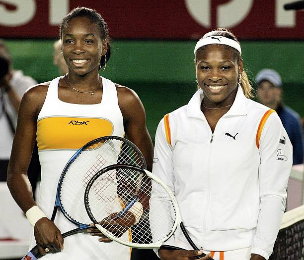 Serena Williams at Australian Open 2003 Final — white, black, and orange Puma outfit