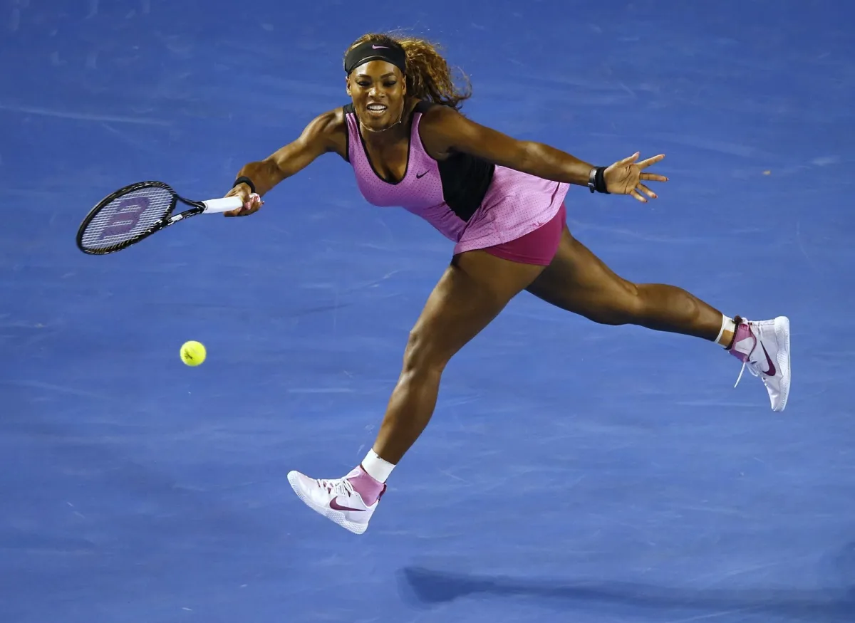Serena Williams at Australian Open 2014 Round 1 — purple and white Nike outfit
