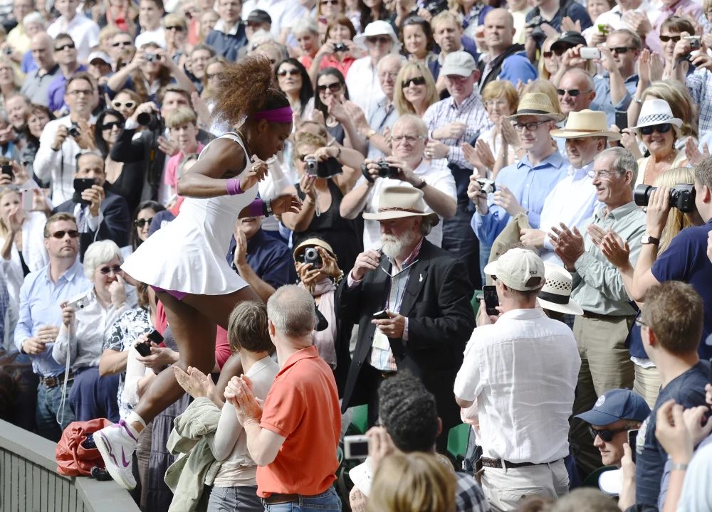 Serena Williams at Wimbledon 2012 Final — white and purple Nike outfit