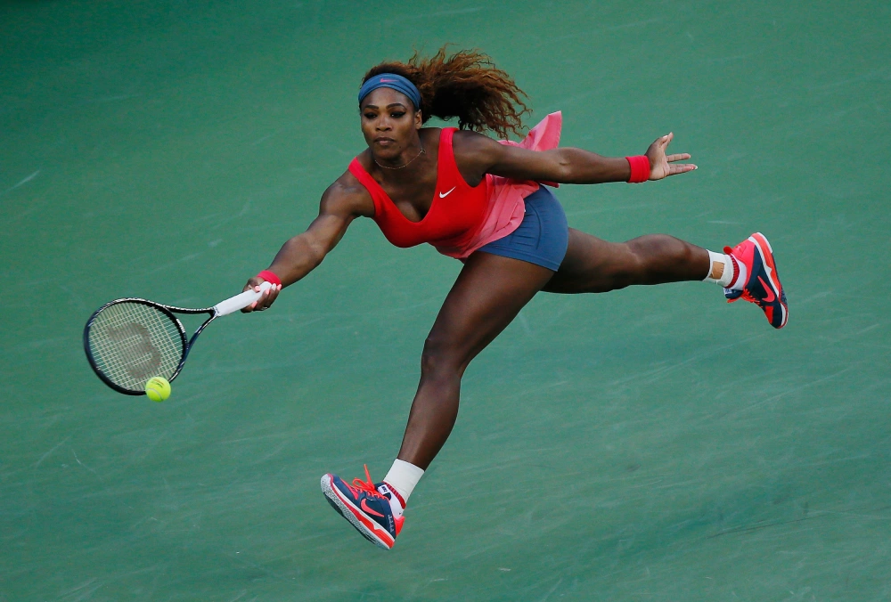 Serena Williams at US Open 2013 Final — red and blue Nike outfit
