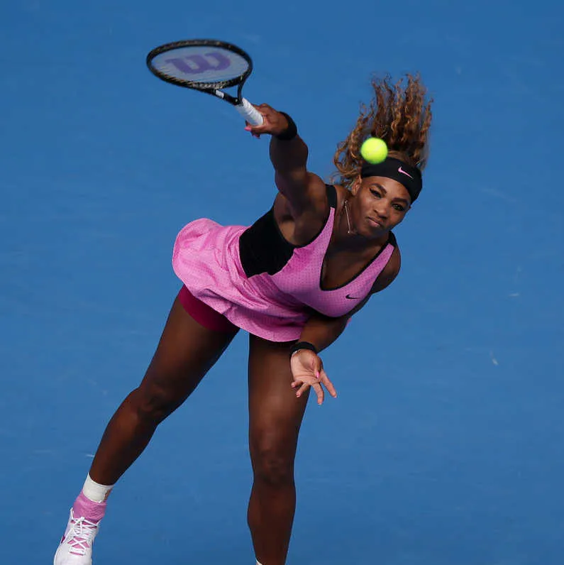 Serena Williams at Australian Open 2014 Round 2 — black and purple Nike outfit