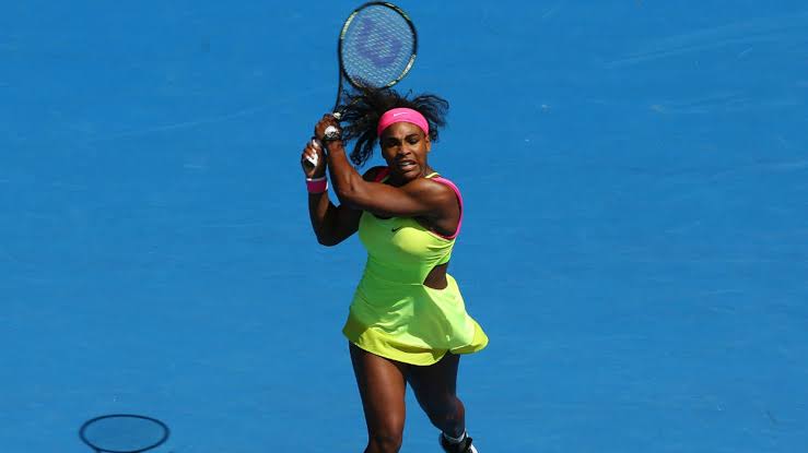 Serena Williams at Australian Open 2015 Round 2 — pink and green Nike outfit