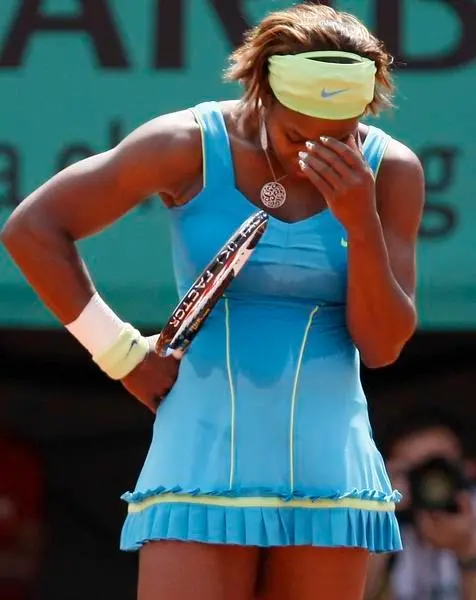 Serena Williams at Roland Garros 2010 Quarter-Final — blue and green Nike outfit
