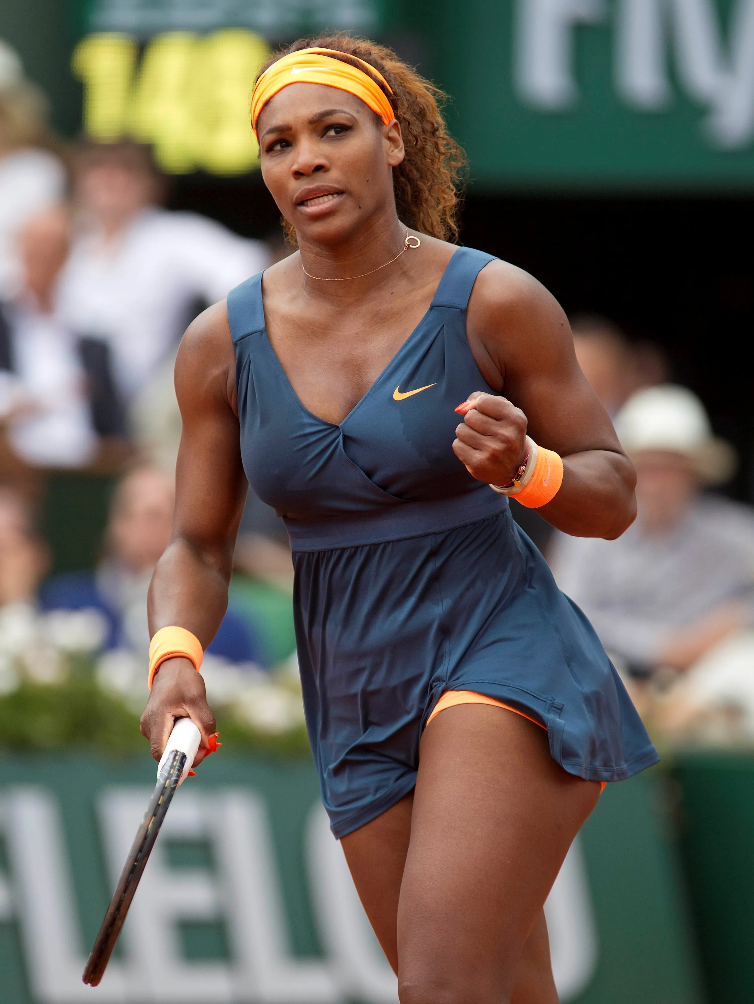 Serena Williams at Roland Garros 2013 Round 4 — blue and orange Nike outfit