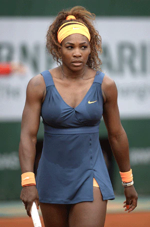 Serena Williams at Roland Garros 2013 Round 3 — orange and blue Nike outfit
