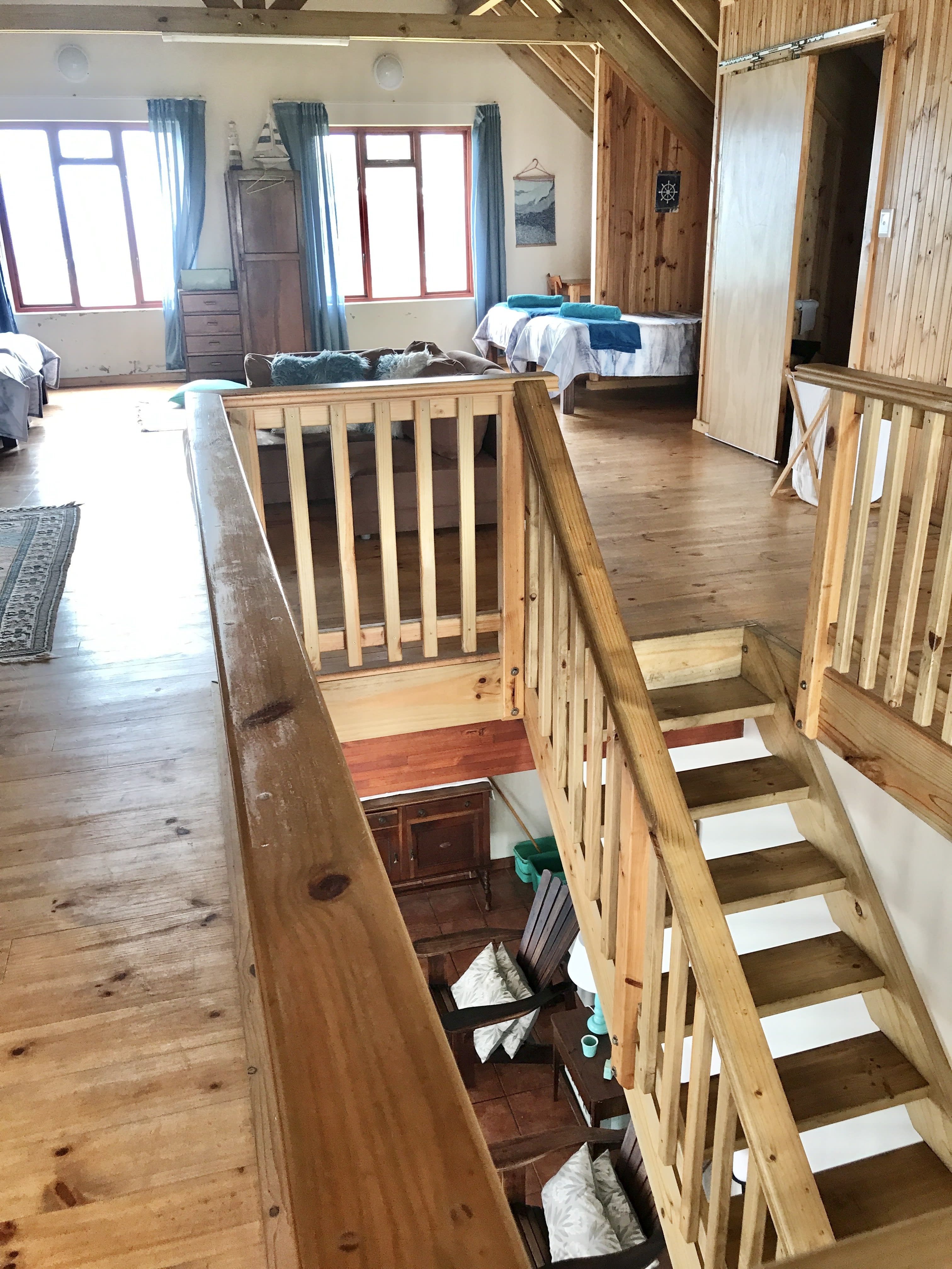 Four single beds with individual desks in The Loft, On The Rocks Villa, Eersterivierstrand