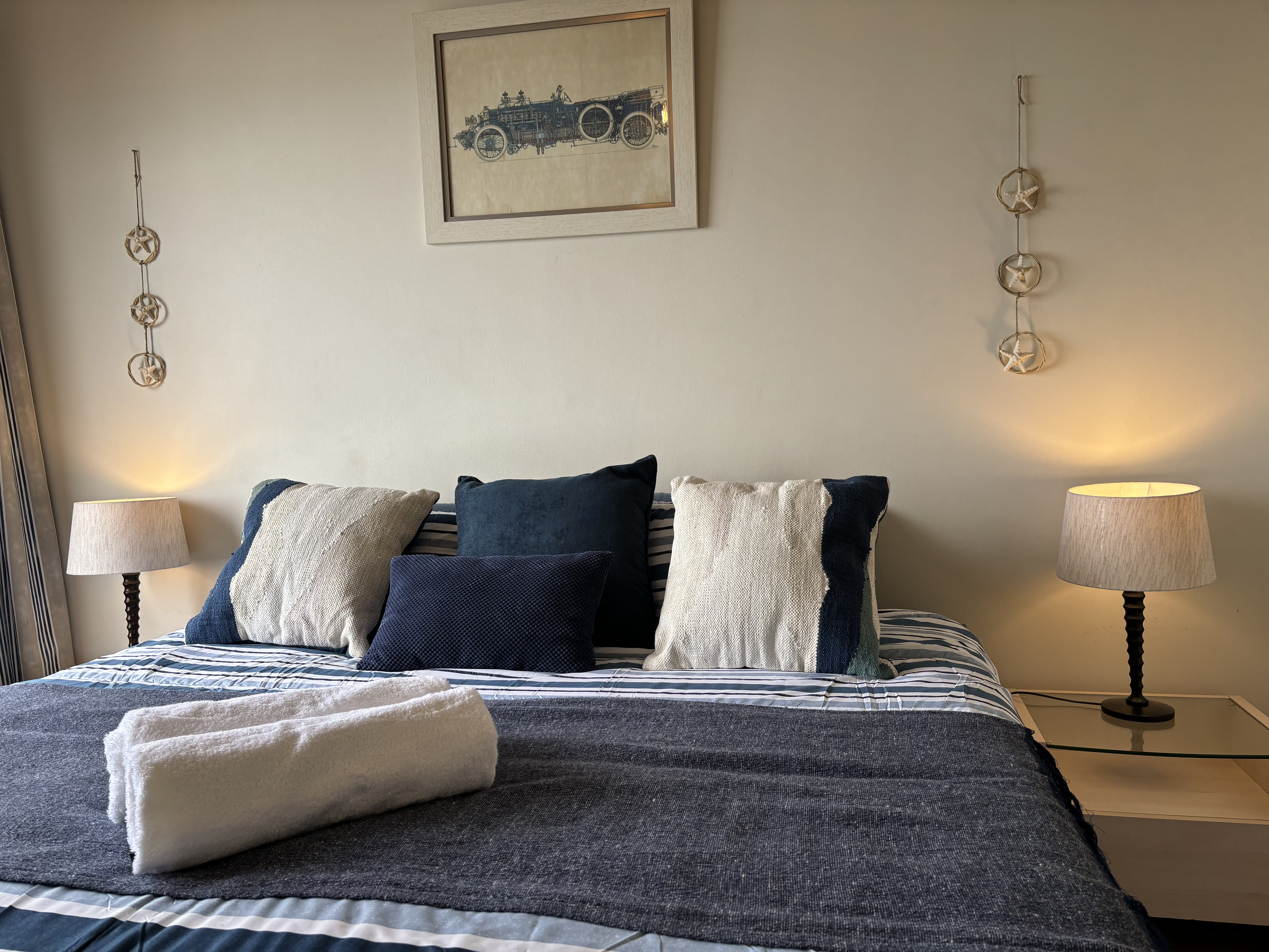Interior details and natural light in The Garden Room beach house bedroom