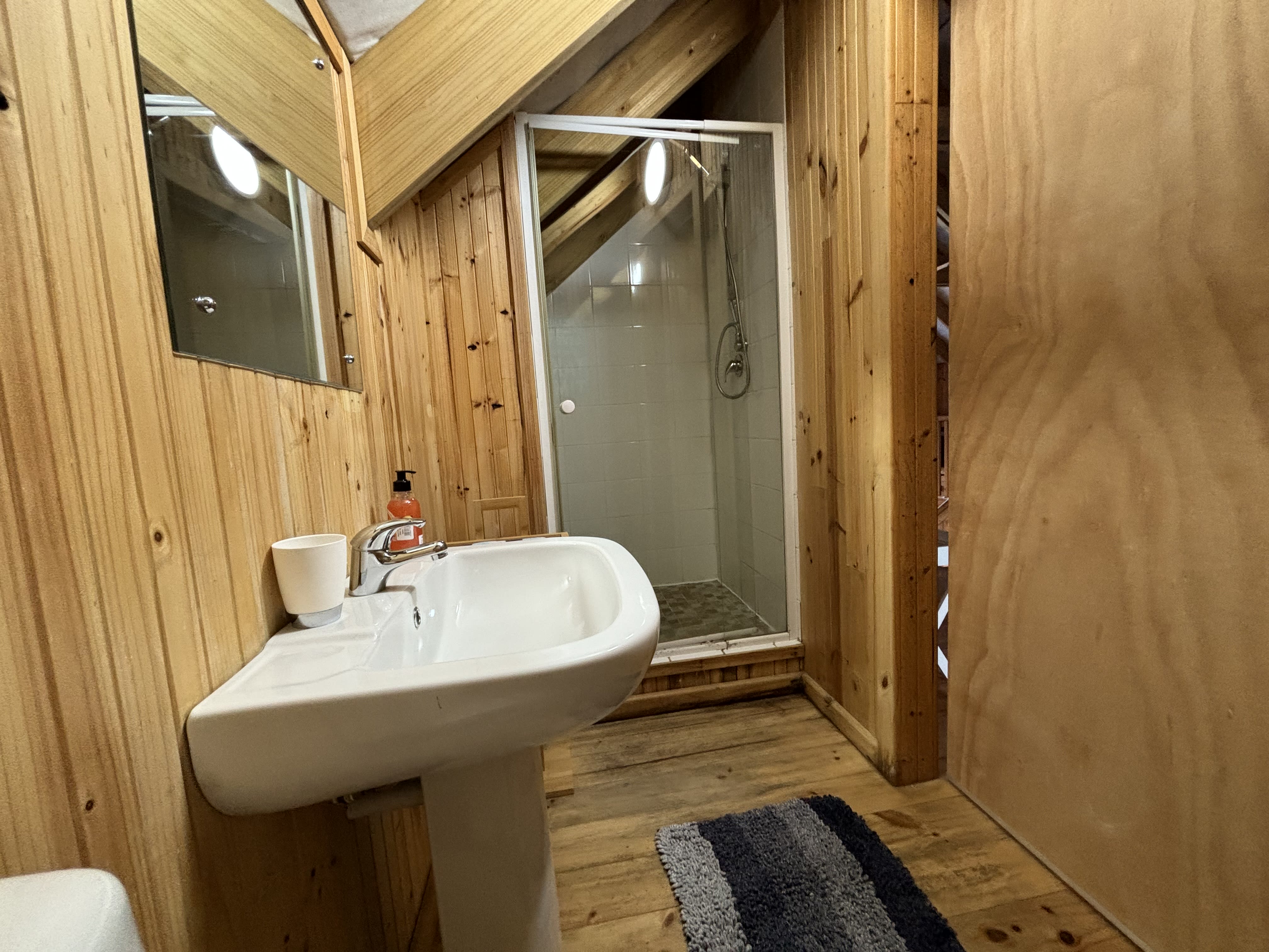 Dedicated shower bathroom in The Loft at On The Rocks Villa