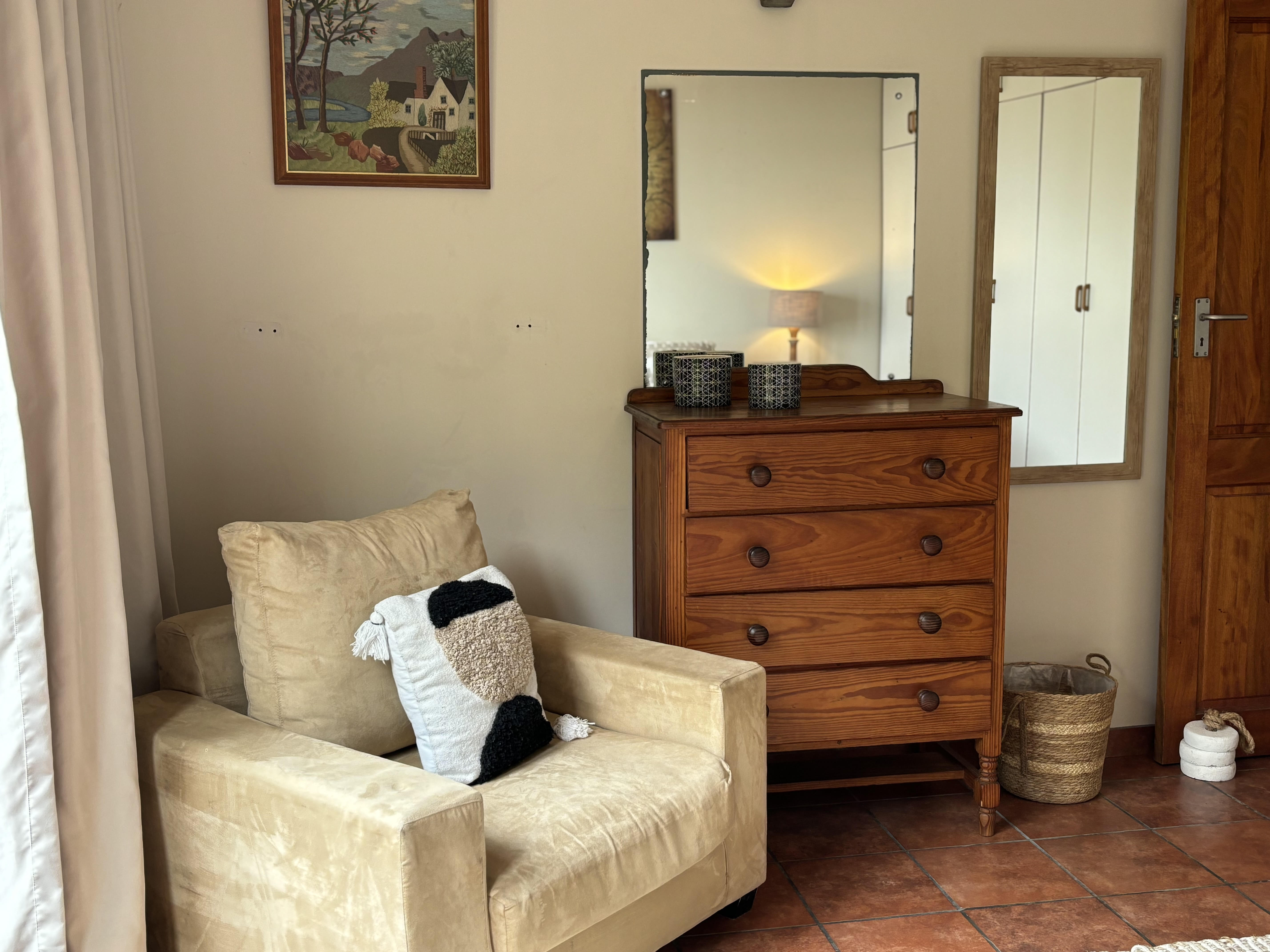 Ensuite bathroom with shower and bathtub serving The Sunrise Room