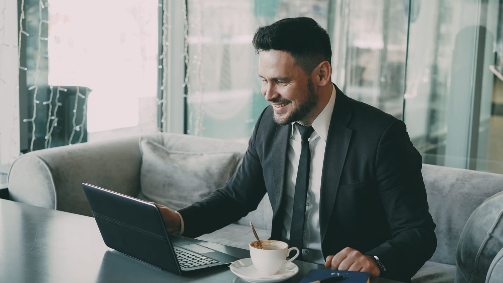 Professional using laptop with AI automation