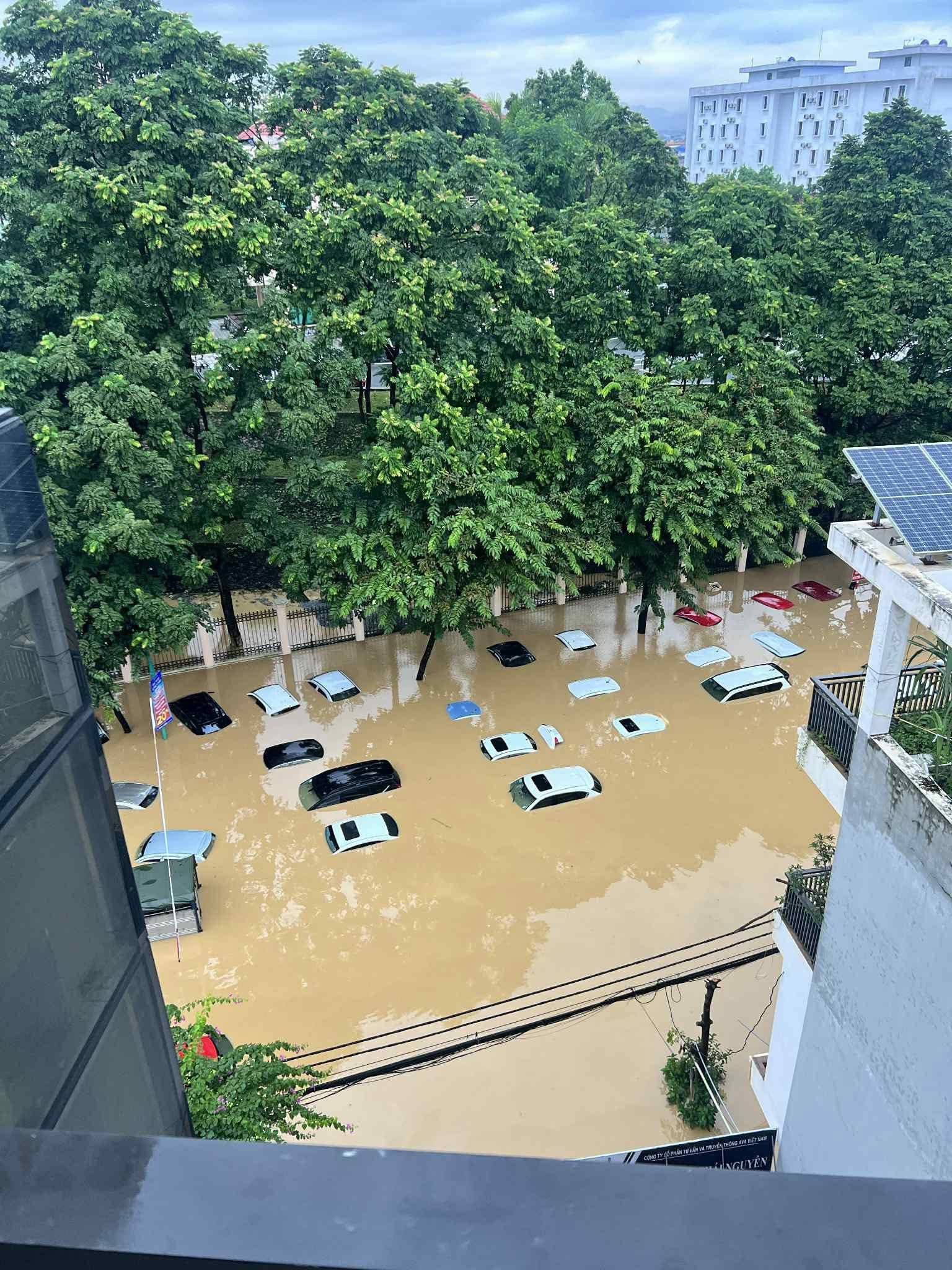 Thousands of cars submerged in floodwaters in Thai Nguyen after Typhoon Matmo