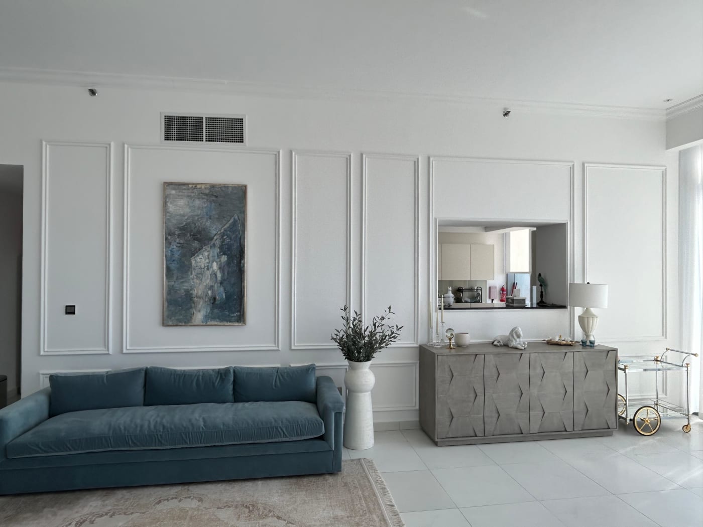 Living room wall moulding after install