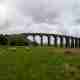 A panorama of Ribblehead Viaduct from a distance.